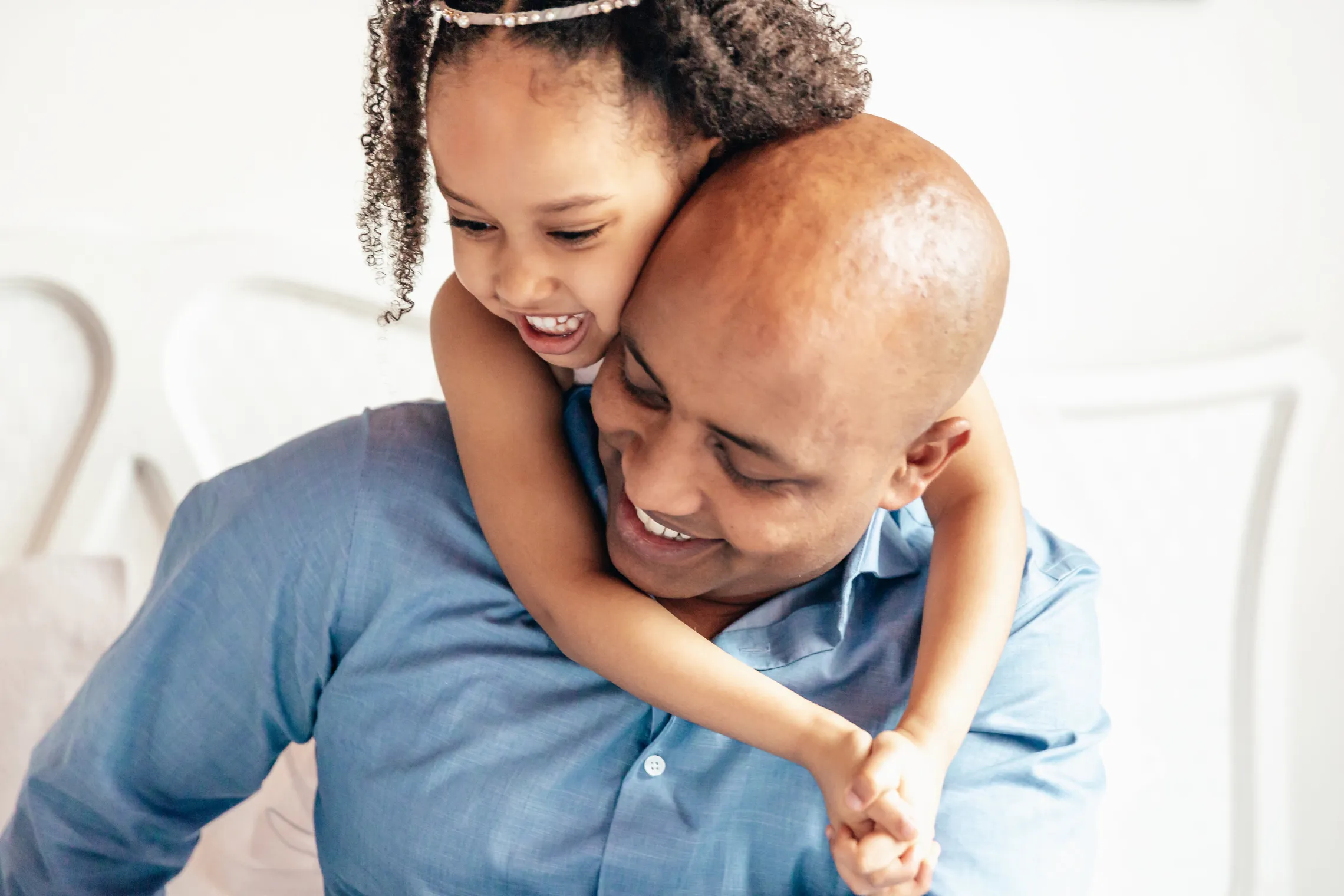 A daughter and father enjoy time together.