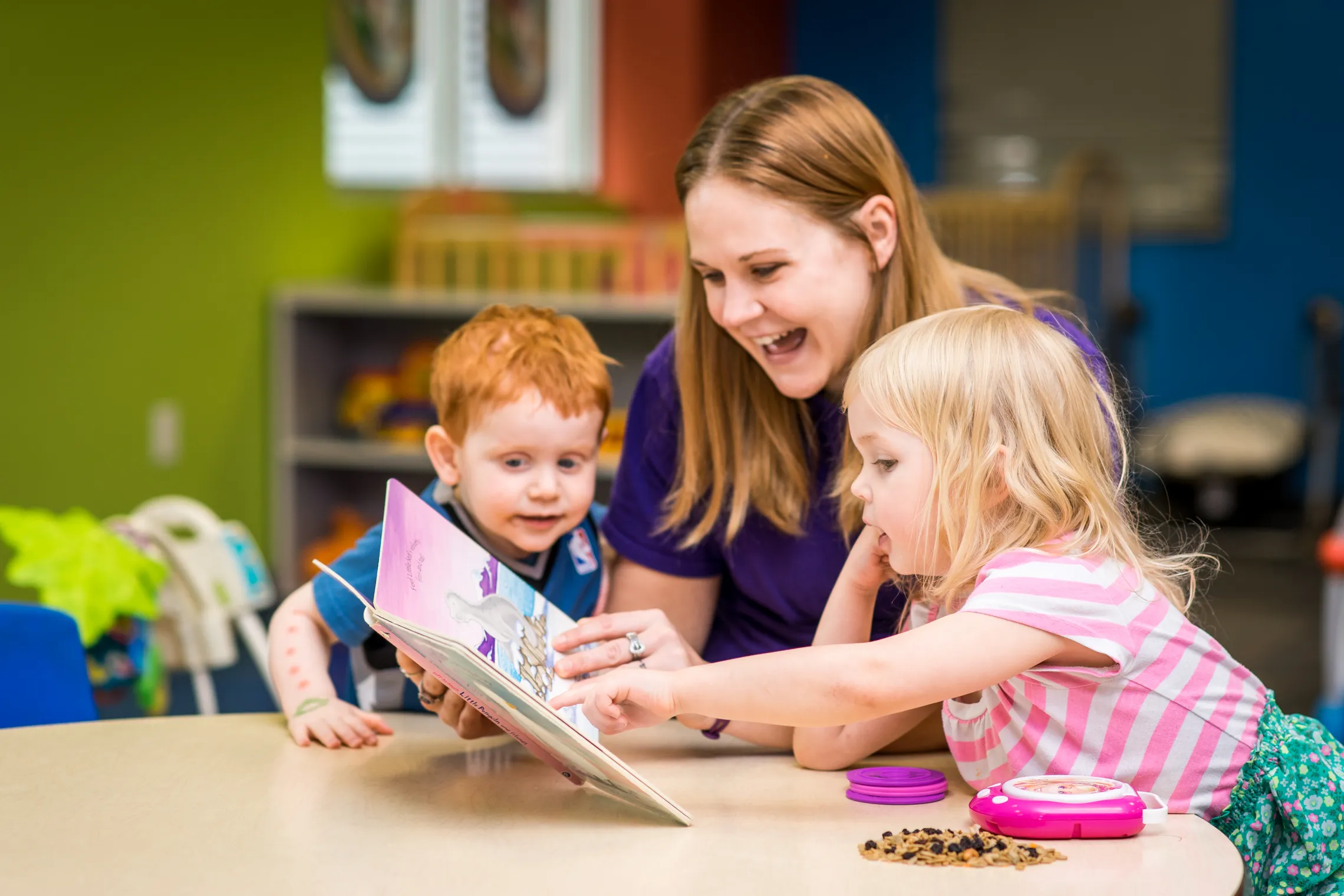YMCA staff and two children